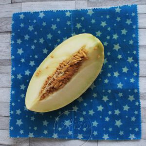 blue and white star beeswax wrap to store fruit