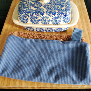 Reusable paper towels in blue stripes on a chopping board