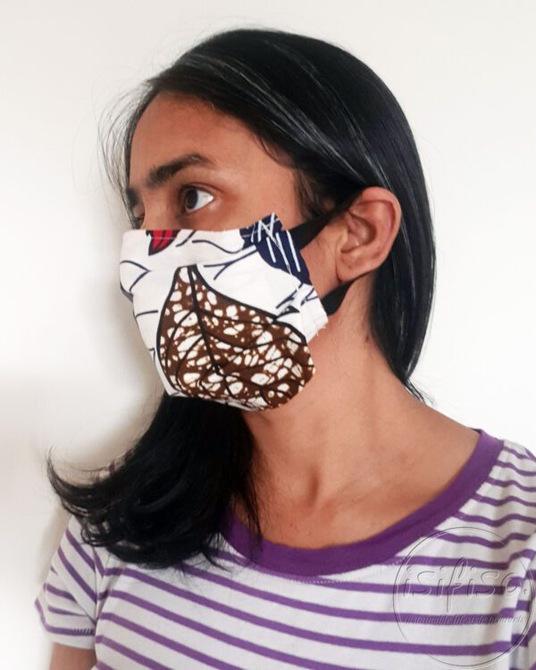 Washable face mask Cream leaves printed masks triple layer mask with nose wire and elasticated on a model side view