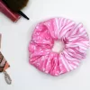 pink scrunchy on white background