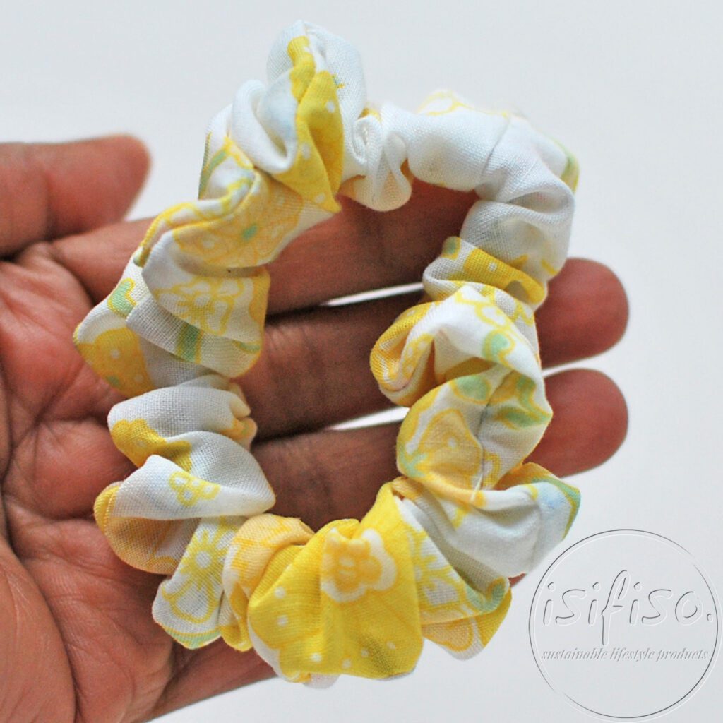 narrow handmade eco hair tie ditsy multi color flowers printed on a hand
