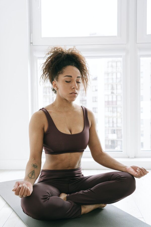 sustainable clothing woman meditating