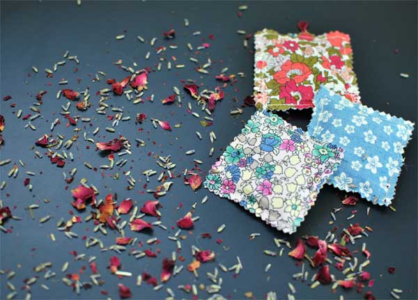 Blue & Pink Lavender sachets closeup on dark background - eco friendly products