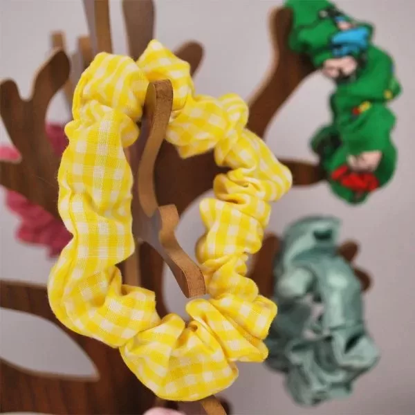 yellow scrunchie on tree 2 jpg webp Eco Friendly products,sustainable products,environmentally friendly products
